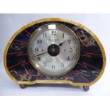 An Art Deco French Boulle-Clock, the wide, balloon shaped,