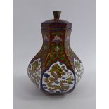 An early 20thC Oriental cloisonne vase of hexagonal form with a cover,