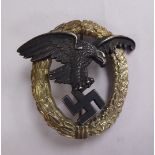 A German Luftwaffe Observer badge, stamped CE Junker, Berlin,