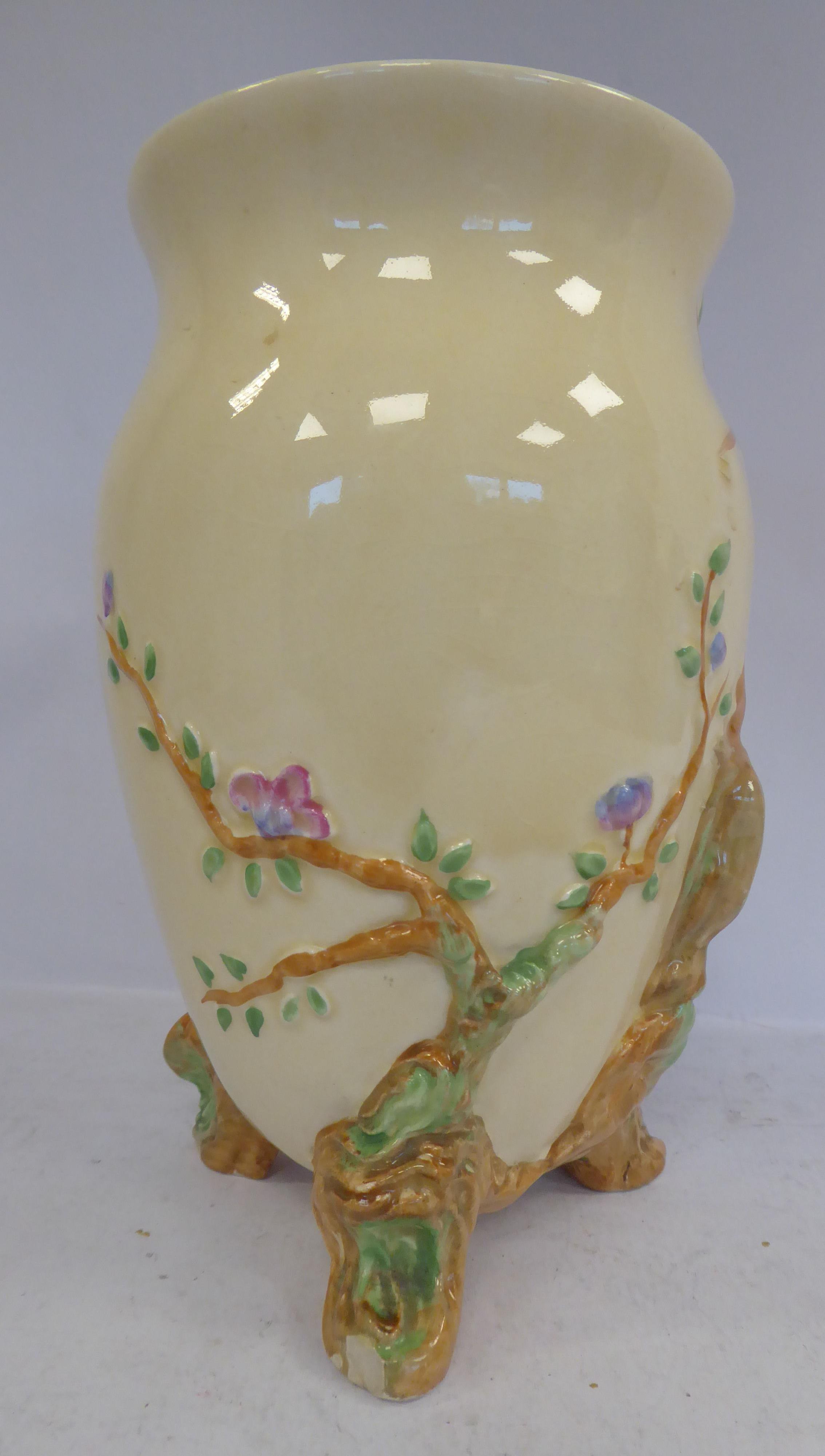 A Clarice Cliff cream glazed china vase of ovoid form, having a flared rim, - Image 3 of 5