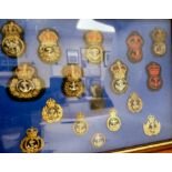 A collection of Naval cap badges, some copies,