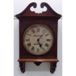 A late 19thC mahogany cased wall timepiece with a swan neck pediment and a reed carved surround,