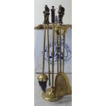 A modern lacquered brass four piece fireside companion,