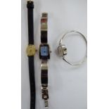 Three dissimilar stainless steel and other cased ladies' wristwatches 11