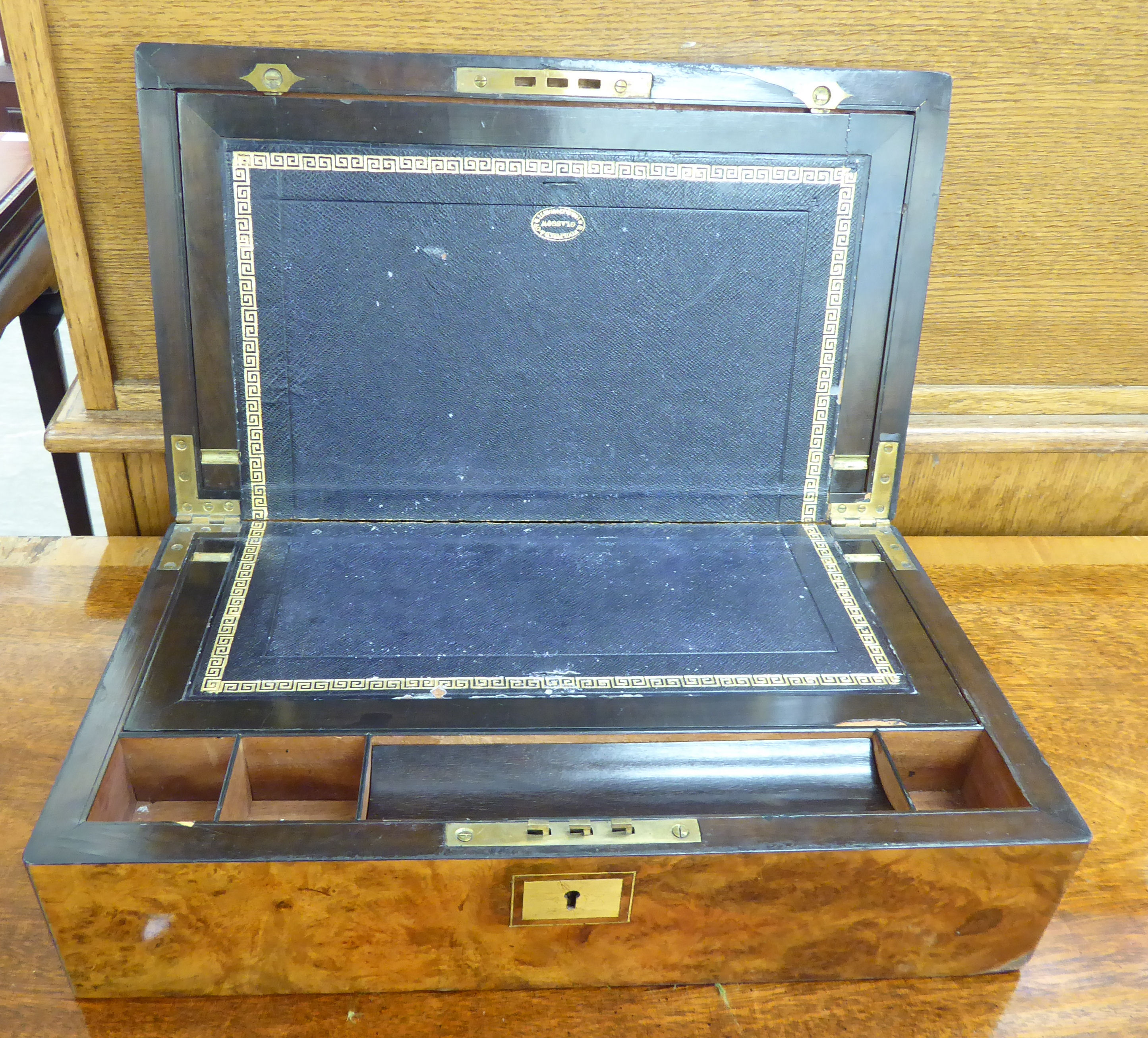 A late Victorian figured walnut veneered writing box with straight sides,