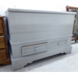 A modern satin grey painted pine dower chest with a rising top,