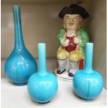 Decorative ceramics: to include a graduated set of three Chinese design blue glazed porcelain vases