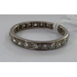 A white metal and diamond set eternity ring 11