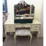 A modern Maple, Continental style, cream painted mahogany five drawer kneehole dressing table,