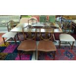 A modern Regency style mahogany dining table, the top with a crossbanded border and reeded edge,