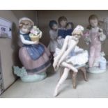 Decorative ceramics: to include a Lladro porcelain group, three children singing hymns 6.