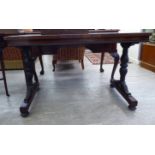 A late Regency rosewood centre table, the top having re-entrant corners, raised on opposing,