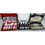 A silver plated set of six dessert spoons and forks cased;