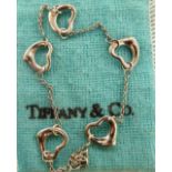 A Tiffany & Co platinum heart design and multi-link bracelet 11