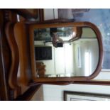 An early 20thC mahogany framed toilet mirror,