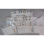 Silver plated flatware and cutlery in five fabric rolls OS10
