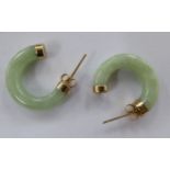 A pair of 9ct gold mounted jade crescent shaped earrings 11