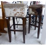 A pair of mid 20thC stained beech framed, square bar stools,