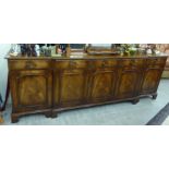 A modern Georgian style crossbanded mahogany breakfront sideboard with five frieze drawers,