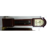 A modern mahogany cased grandmother clock with an arched hood, straight trunk,