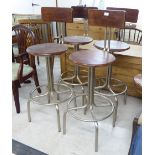 A set of four modern satin painted silvered tubular steel framed bar stools with solid mahogany