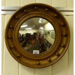 An 'antique' inspired convex mirror,