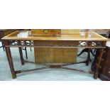A modern Chippendale inspired mahogany centre table, the narrow, rectangular top with a satinwood,