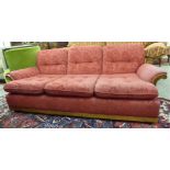 An Ercol elm showwood framed triple ladderback three person settee,