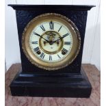 An early 20thC black painted cast iron cased Ansonia mantel clock with straight sides,