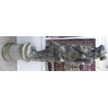 A composition stone terrace figure, a standing female in classical pose,