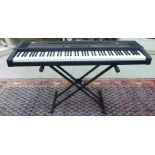 A Roland EP-97 electric keyboard,