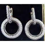 A pair of 14ct gold white and black diamond set Art Deco design disc pendant earrings cased