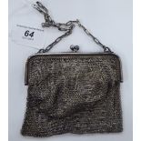 A Continental silver coloured metal chain mail evening purse,