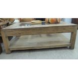 A modern rustically cut planked elm coffee table,