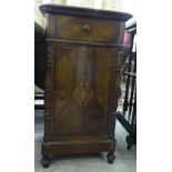 A mid 19thC mahogany pedestal cabinet, comprising a short drawer above a door,