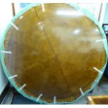 A modern crossbanded mahogany table top,