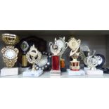 Variously constructed trophies various sizes and forms largest 11''h OS10