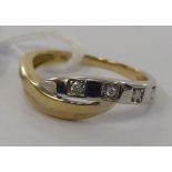 A 9ct bi-coloured gold four stone crossover set diamond ring 11