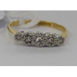 An 18ct gold five stone diamond ring 11