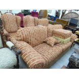 A modern five piece suite, upholstered in tasselled,