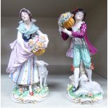 A pair of early 20thC Sitzendorf porcelain figures, a man and woman holding a basket of flowers 7.