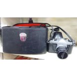 A Pentax SP500 35mm camera cased with accessories OS10