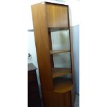 A modern teak corner unit with angled sides, comprising a high level cupboard,