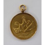 A 9ct gold medallion,