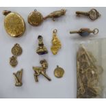Gold and gold coloured metal items of personal ornament: to include pendant charms 11