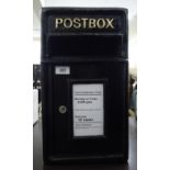 A modern reproduction of a black painted post box with a hinged door 18''h 10''w RAB