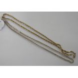 A silver curb link neckchain;