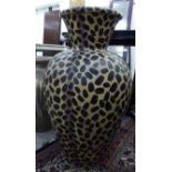 A modern pottery terrace vase of baluster form with a flared rim,