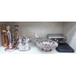 Silver plated table and other metalware: to include an oil cruet with two cut glass decanters,