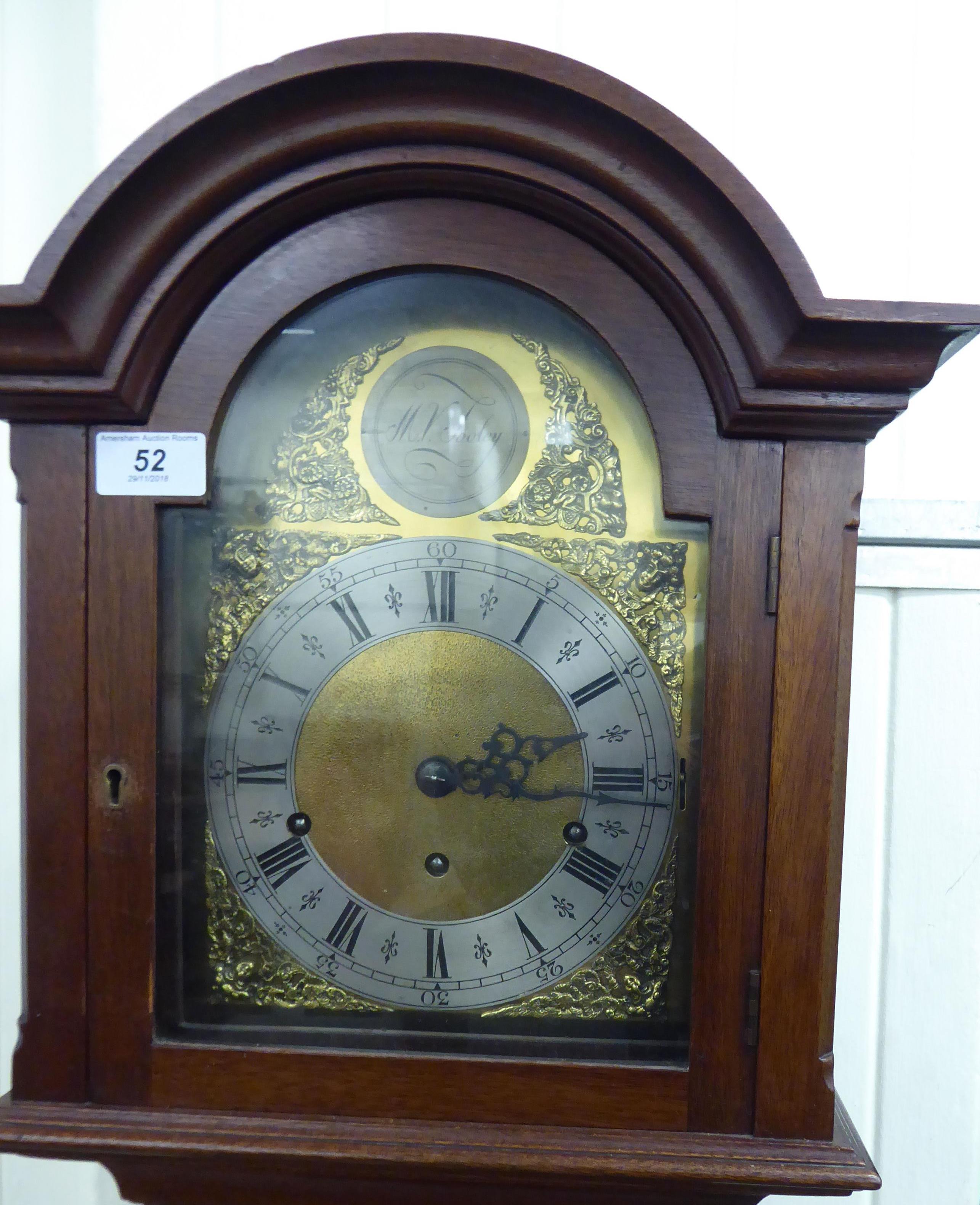 A mid 20thC mahogany cased grandmother clock, the hood with an arched top, over a straight trunk, - Image 2 of 2